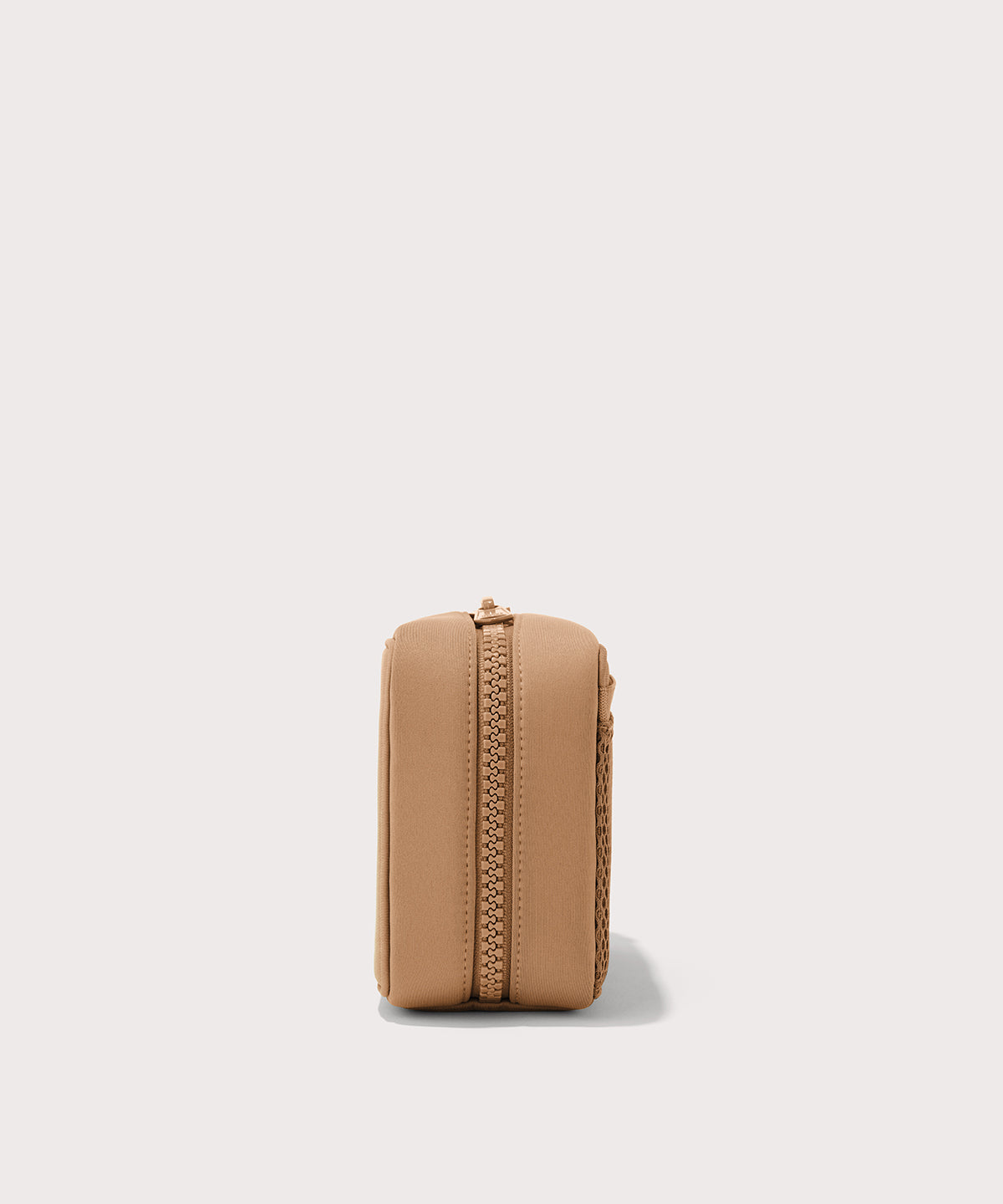 Dagne Dover large Arlo Tech Organizer in camel seen from the side.
