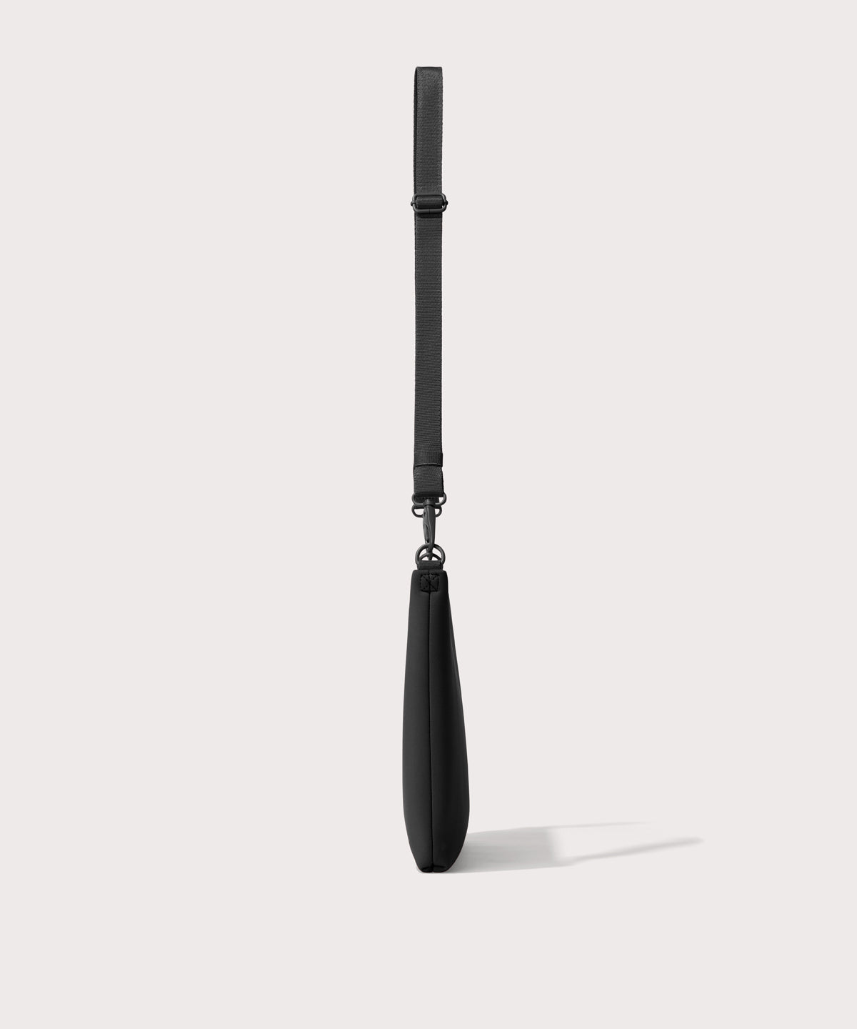 14 inch laptop shoulder bag in a black seen from the side.