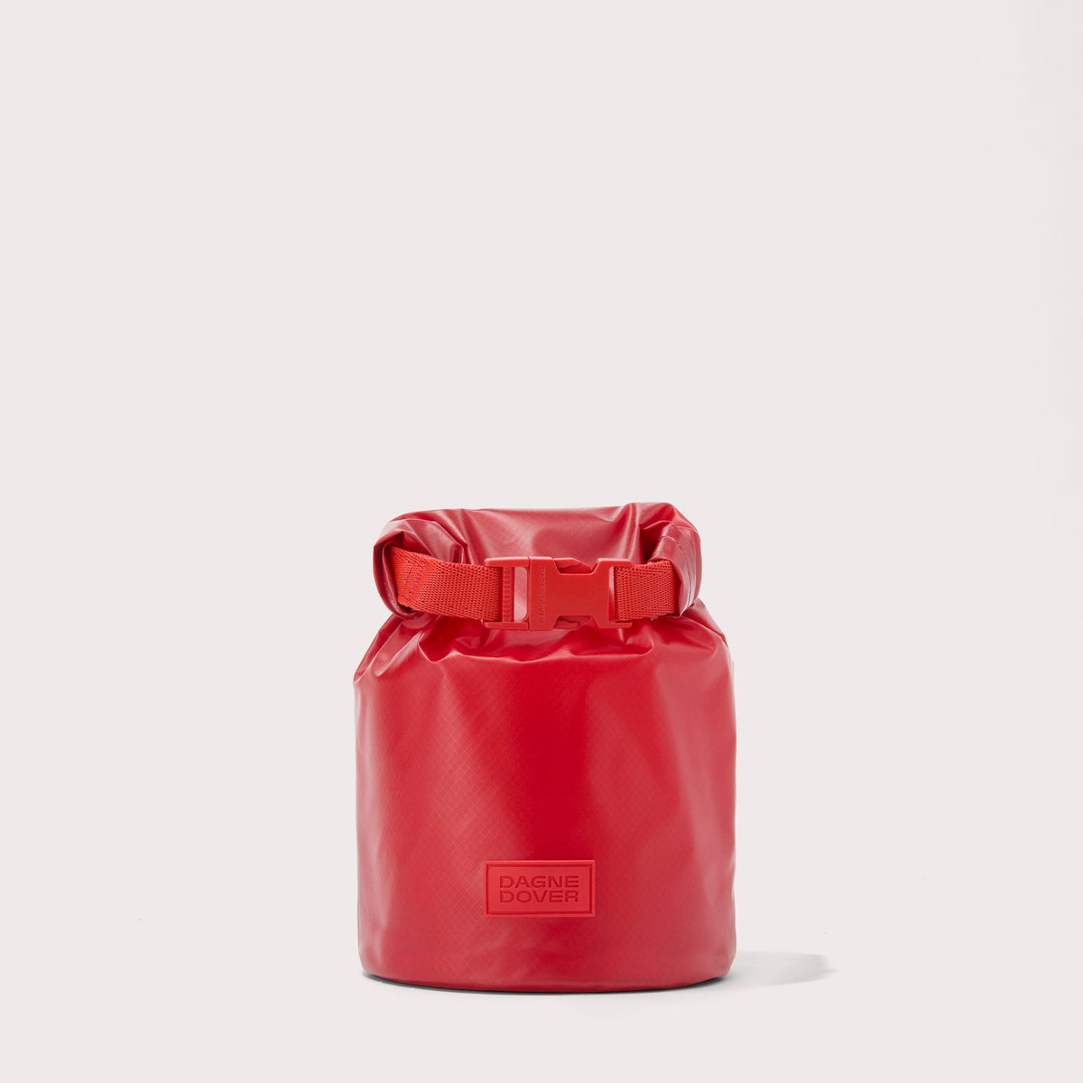 Dagne Dover Rae Roll-Top Dry Bag in a fiery, saturated red leaning toward orange.