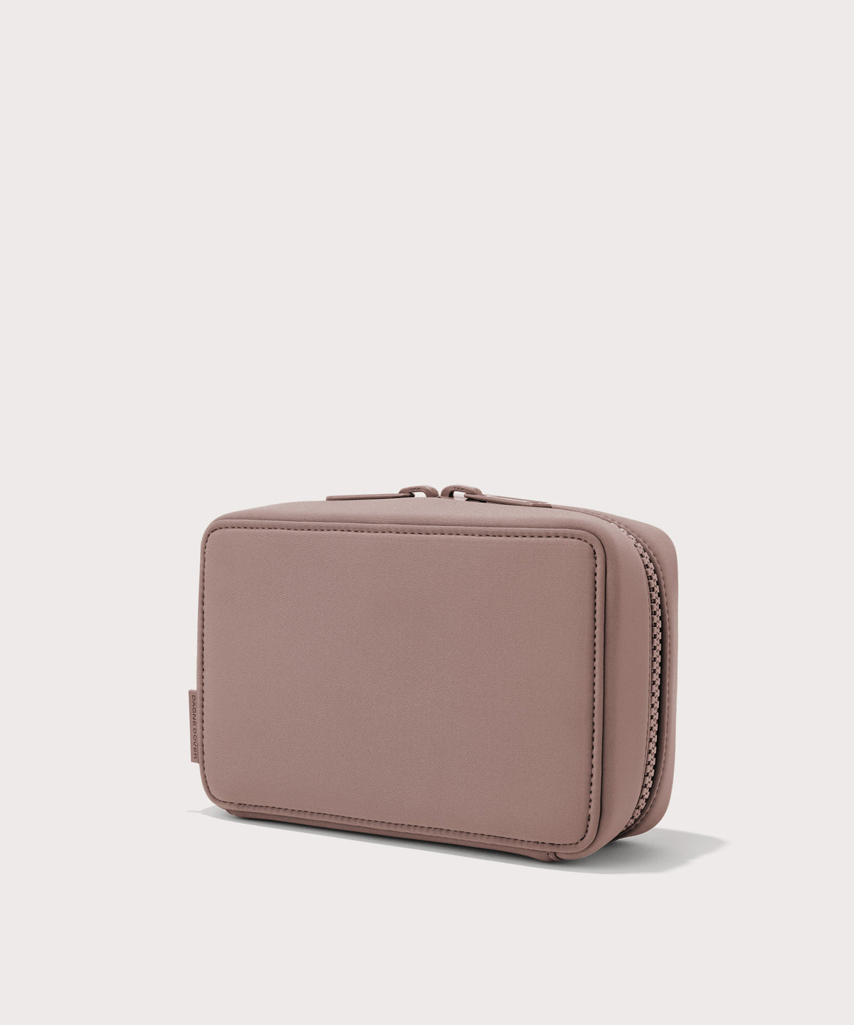 Dagne Dover large Arlo Tech Organizer in pink seen from an angle.