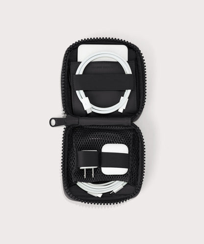 hover - Dagne Dover small Arlo Tech Organizer in black unzipped, revealing the interior elastic loops and airmesh pockets.