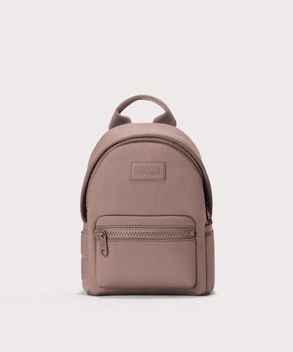 Dagne Dover Dakota Small Neoprene Backpack in pink.