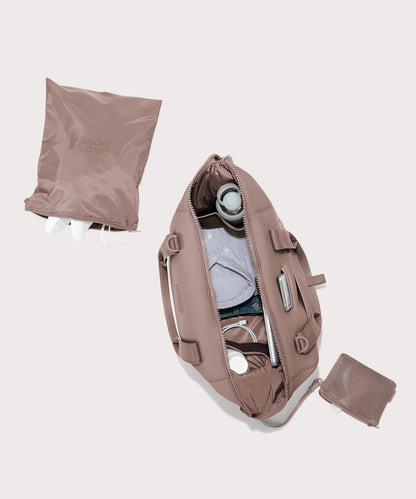 Large Landon Carryall in pink unzipped, top down view