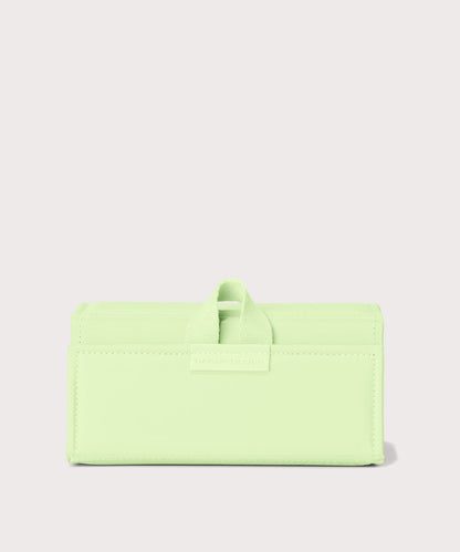 Dagne Dover Remi foldable glasses holder in matcha green.