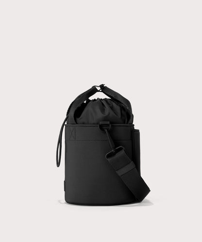 Dagne Dover Nico Bucket Bag in black, side angle.